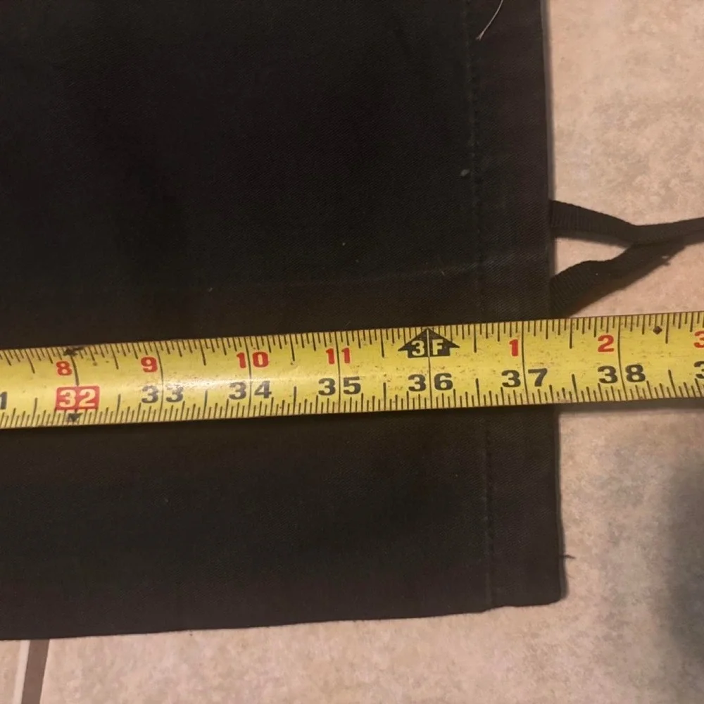 Black vintage cargo pants with adjustable waist and ankle ties